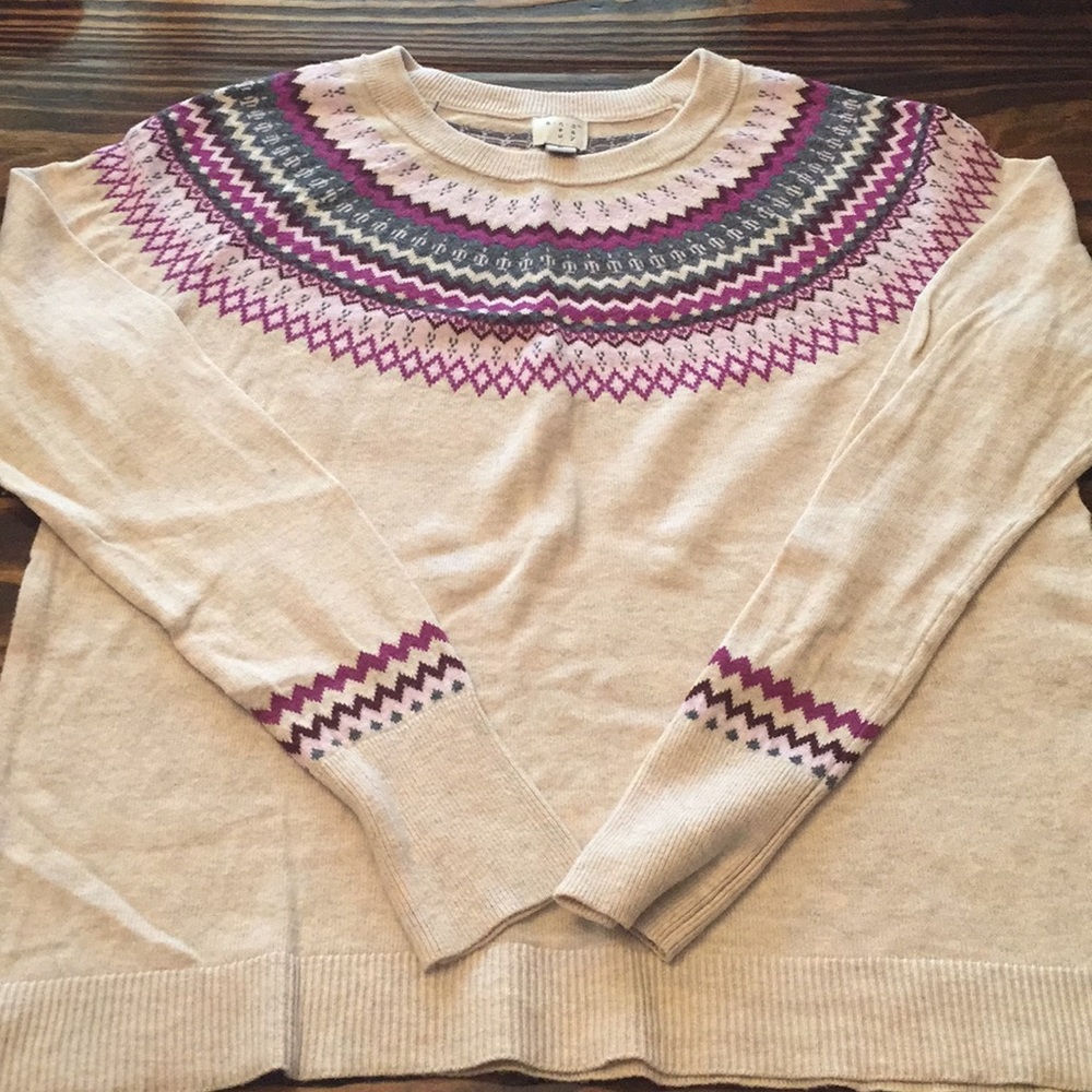 Cream sweater with purple accents